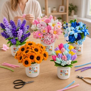 May include: Five white ribbed ceramic vases containing various crocheted flower arrangements, including purple lavender, pink and white mixed blooms, blue lilies, orange sunflowers, and multicolored tulips, each with a Best Wishes label.