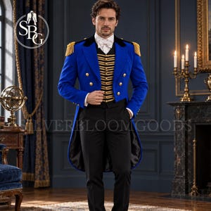 May include: A royal blue tailcoat jacket featuring gold epaulettes, a black velvet collar, and gold buttons. Underneath is a black waistcoat with horizontal gold braided trim and a white cravat. The ensemble includes black trousers and a white shirt.