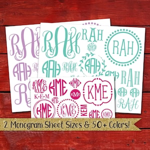 May include: Three sheets of monogram stickers with various designs and styles. The sheets feature the letters "RAH" and "KME" in different fonts and colors, including purple, teal, and pink.