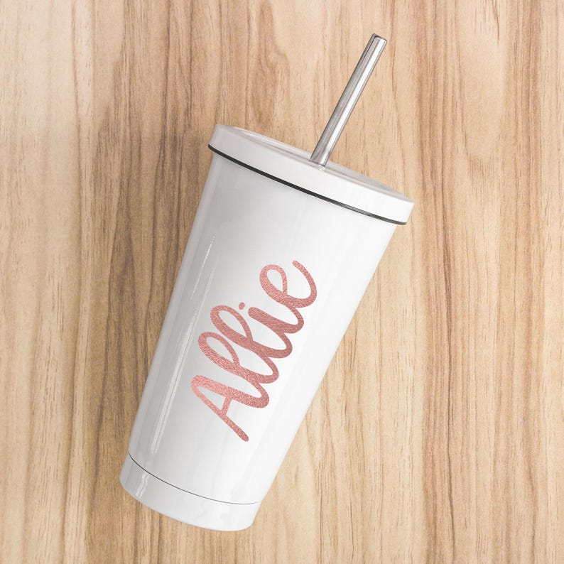 May include: White insulated tumbler with a rose gold name "Allie" on the side. The tumbler has a lid and a stainless steel straw.