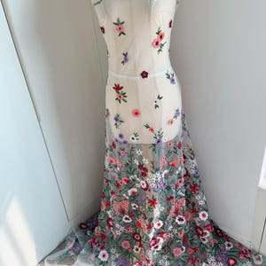 Colorful embroidered tulle fabric with multicolor florals