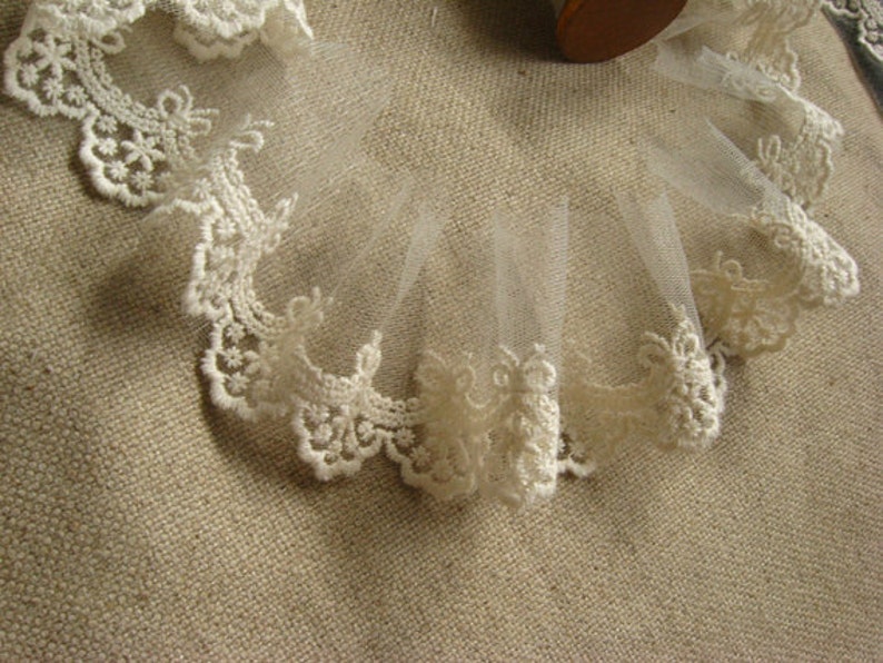 ivory lace trim , small cotton embroidered lace, scalloped lace with bows image 5