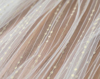 Off white Tulle with golden embroidered rain fall