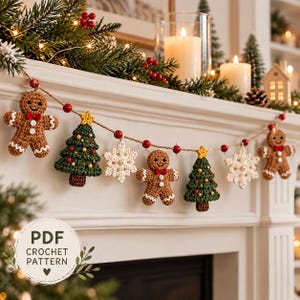May include: A festive crochet garland featuring alternating gingerbread people with red bow ties, green Christmas trees with yellow stars, and white snowflakes, all strung on twine with small red beads. Includes a PDF crochet pattern label.