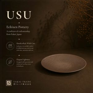 May include: A dark brown, circular ceramic plate with a textured surface. The image includes text: USU, Echizen Pottery, A tradition of craftsmanship from Fukui, Japan, Handcrafted, With Care, Elegant Lightness, and SAKAI TRADE.