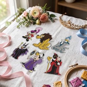 May include: A collection of six embroidered patches featuring Disney characters dressed as villains, including Mickey Mouse as Captain Hook, Pluto as a lion, Donald Duck as Hades, Maleficent, Minnie Mouse as the Evil Queen, and Goofy as Jafar.