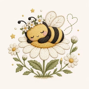 May include: An embroidery design featuring a yellow and black striped bee with a daisy crown sleeping on a large white daisy. The scene includes green stems, leaves, two smaller daisies, yellow stars, and a dotted heart outline in green thread.