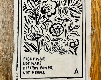 Floral Patch // Fight War Not Wars // Destroy Power Not People // Punk Patch // Peace // Back Patch // Compassion // Love // No War