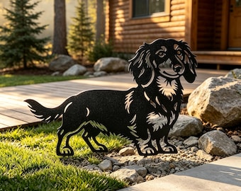 May include: A black metal silhouette of a long-haired dachshund dog standing in profile. The cutout design features detailed fur textures and facial features, crafted from a flat, dark material with a matte finish, positioned upright.