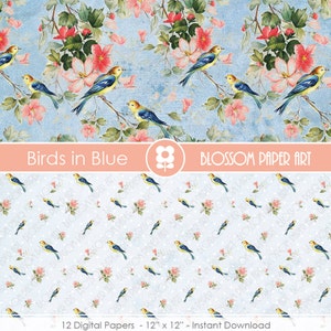 May include: A digital paper pack with 12 designs featuring a repeating pattern of blue birds and pink flowers on a light blue background. The text "Birds in Blue" and "Blossom Paper Art" is displayed on the top of the image.