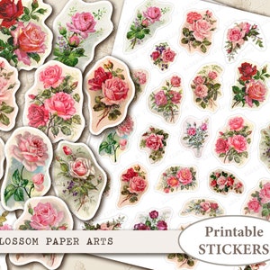 May include: Printable stickers featuring pink and red roses with green leaves. The stickers are arranged in a grid pattern on a white background. The text "Printable Stickers" is at the bottom of the image.