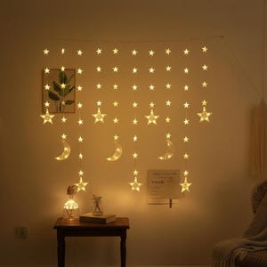 Warm White Fairy Curtain Lights - Star & Moon Decor for Bedrooms and Nurseries