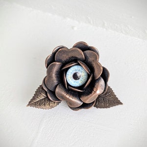 Antiqued Copper Floral Eye Brooch: Moody Costume Jewelry
