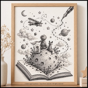 May include: A black and white cross-stitch pattern in a wooden frame depicting a small figure and a fox sitting on a planet emerging from an open book. The scene includes a biplane, a crescent moon, stars, a rose in a glass dome, and a fountain pen.