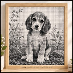 May include: A square cross-stitch embroidery featuring a black and white portrait of a beagle puppy sitting in a grassy field with plants. The artwork is encased in a light-coloured wooden frame. The text at the bottom reads: 2026 CegaCrossStitch - Tous droits réservés / All rights reserved.