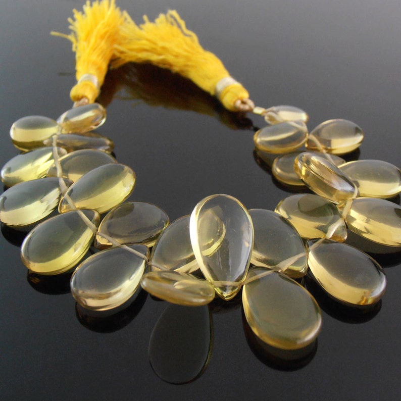 Unfaceted Champagne Quartz Pears 7x10-9x16 mm Set of 24