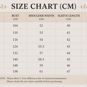 May include: A beige size chart table with dark brown text titled SIZE CHART (CM). It lists sizes from S to XXXXL with corresponding measurements in centimeters for bust, shoulder width, sleeve length, and length. Includes a note about manual measurement.