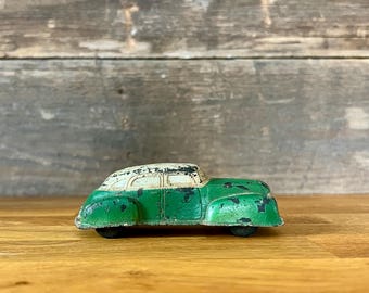 Vintage Sun Rubber Green 4-Door Toy Car