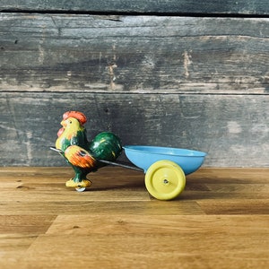 Vintage Wyandotte Zinn Hahn, der Eierwagen-Spielzeug zieht