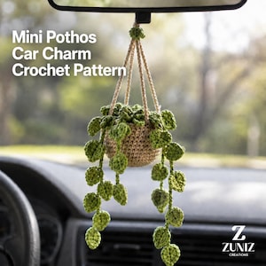 May include: A crocheted hanging plant ornament featuring a tan pot and green leaves, suspended by thin cords. The text "Mini Pothos Car Charm Crochet Pattern" is visible on the left, and the logo "Z ZUNIZ CREATIONS" is in the bottom right corner.
