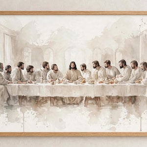 Op de afbeelding: Een ingelijste aquarelprint die het Laatste Avondmaal voorstelt, met dertien figuren aan een lange tafel bedekt met een wit kleed. Het kunstwerk gebruikt een neutraal, sepia-kleurig palet met zachte penseelstreken en lichte kleurvlakken.