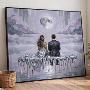 A large, unframed oil painting of a couple on a dripping silver platform under a full moon is displayed on a wooden floor next to a woven basket and a potted plant.
