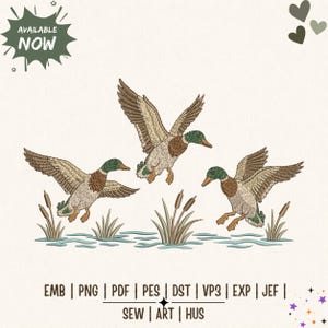 May include: An embroidery design featuring three mallard ducks in flight over water with cattails. The ducks have green heads, brown bodies, and white accents. Text includes AVAILABLE NOW and file formats EMB, PNG, PDF, PES, DST, VP3, EXP, JEF, SEW, ART, HUS.