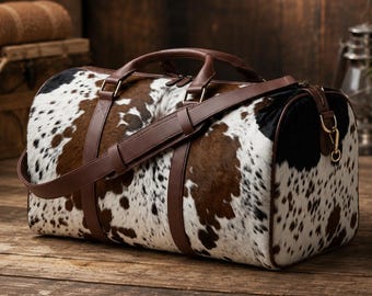 Dreifarbige Reisetasche aus Rindsleder | Handgefertigte Wochenendtasche aus braun-schwarz-weißem Fell | Vintage-Ledertasche