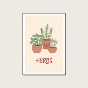 May include: A framed wall art print featuring three potted plants with green foliage in terracotta-colored pots against a light cream background. The word HERBS is printed in a bold, reddish-brown font below the plants, centered in the frame.