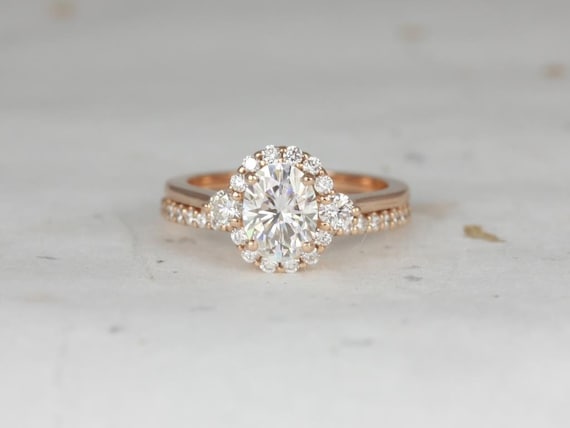 1.50cts Britney 8x6mm 14kt Rose Gold Forever One Moissanite Diamonds 3 Stone Unique Oval Halo Bridal Set