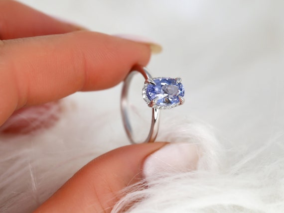 Oval sapphire and diamond halo ring hot sale