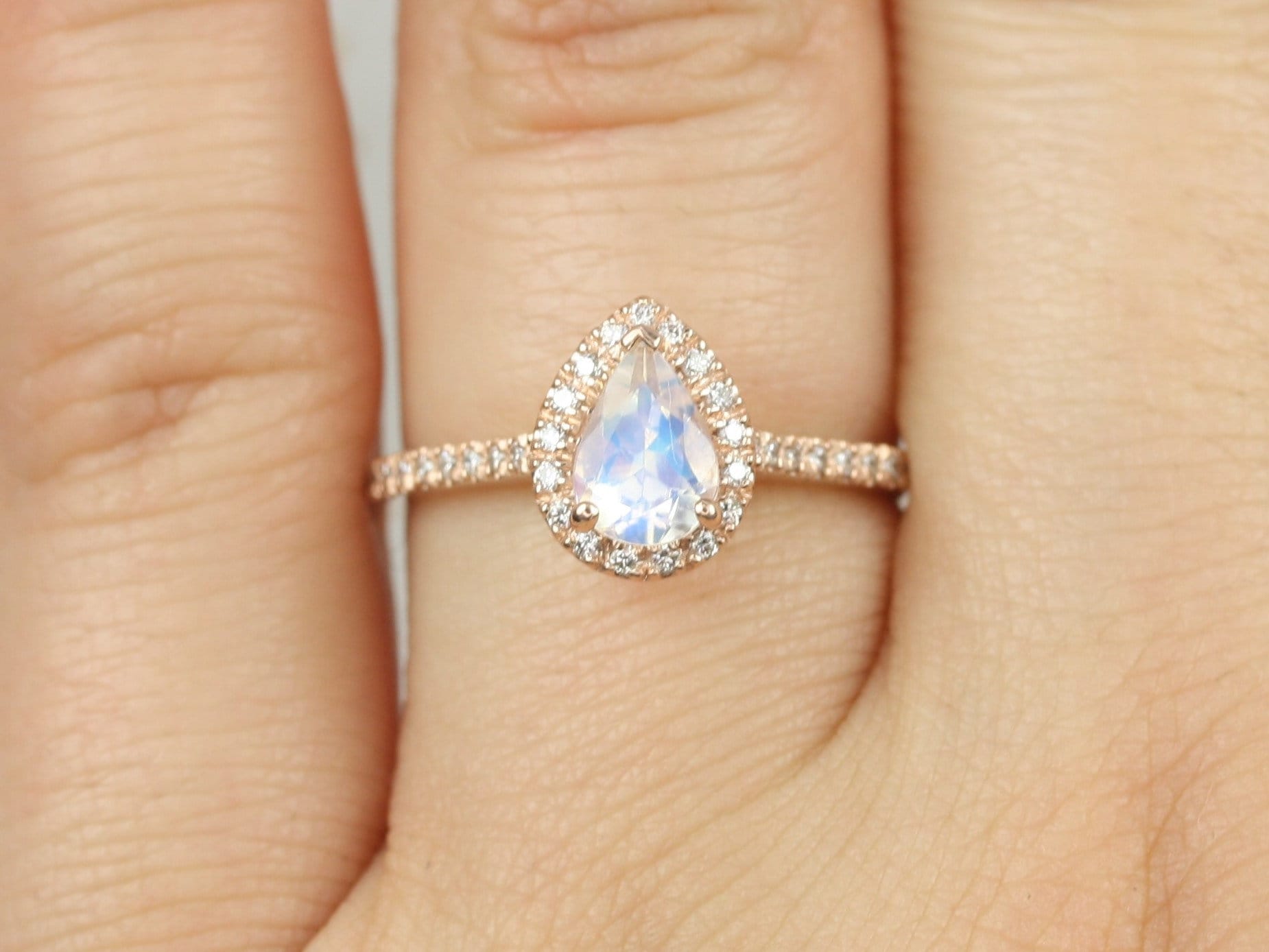 Dainty pear 2024 shaped engagement ring