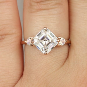 2.20cts Maxine 8mm 14kt Rose Gold Forever One Moissanite Moonstone Round Dainty 3 Stone Asscher Engagement Ring