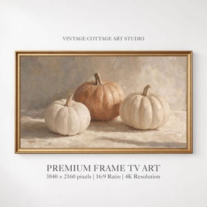 May include: A rectangular framed digital artwork featuring an oil painting style depiction of three pumpkins in shades of cream, beige, and light orange. The text VINTAGE COTTAGE ART STUDIO and PREMIUM FRAME TV ART 3840 x 2160 pixels 16:9 Ratio 4K Resolution.
