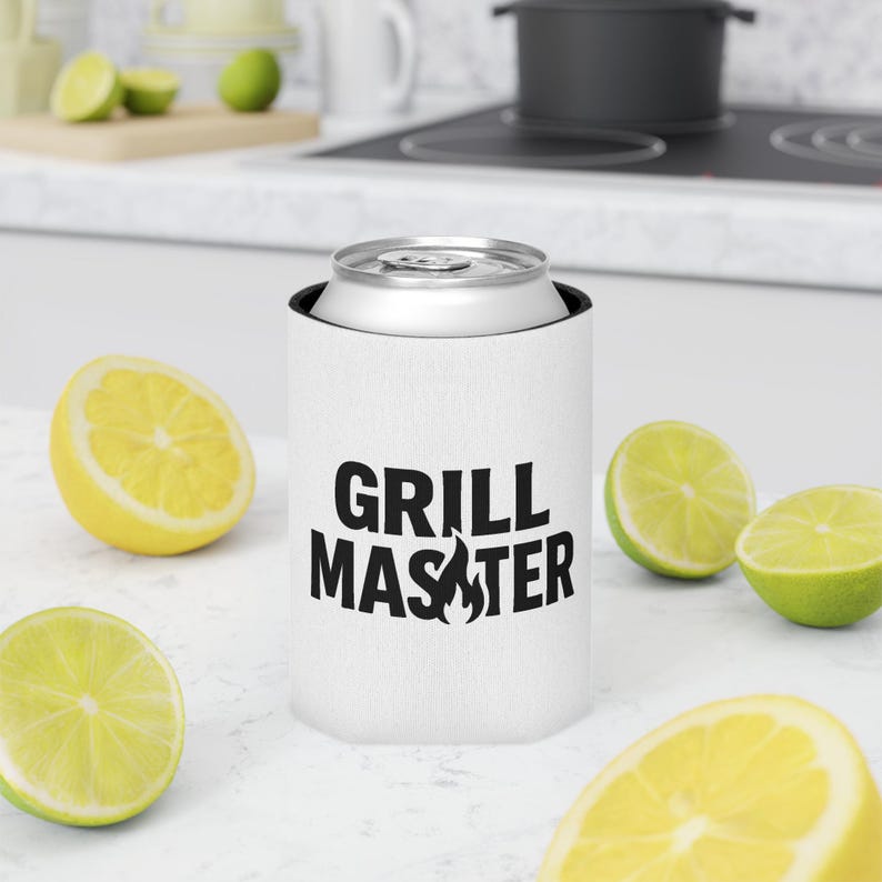 A white cooler with the text "GRILL MASTER" printed on it, surrounded by sliced lemons and limes on a kitchen counter.