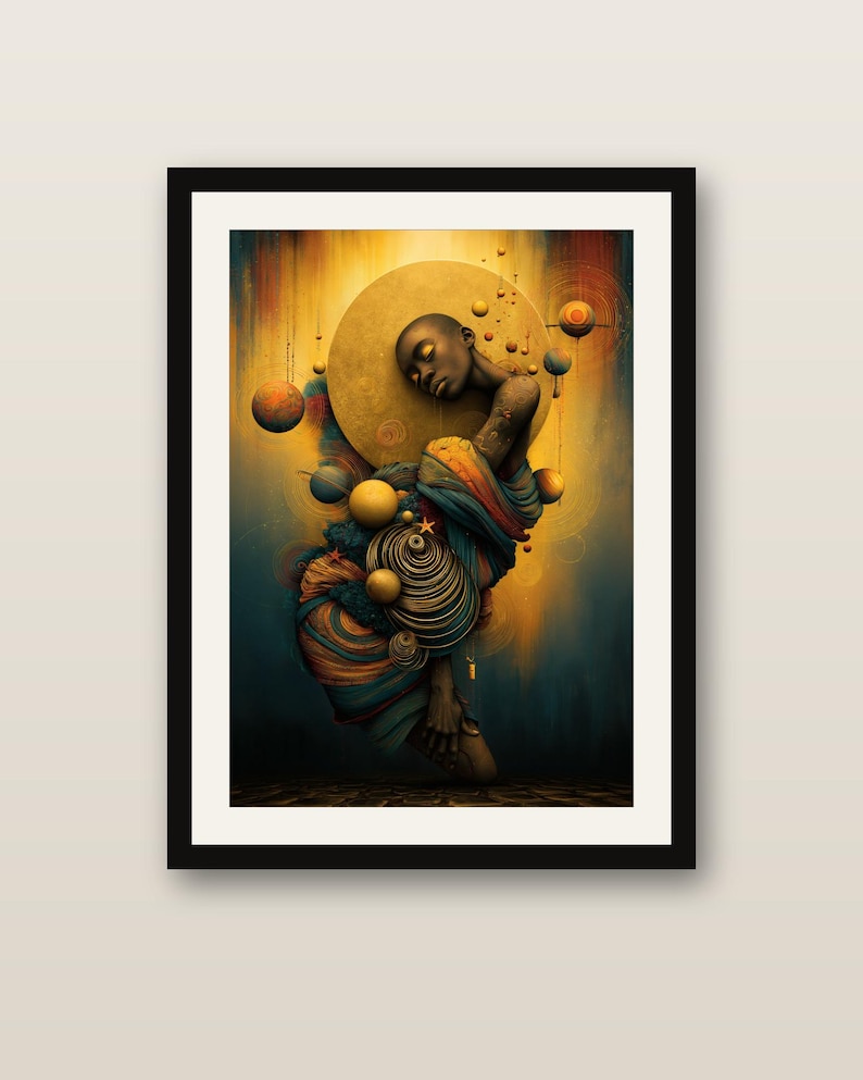 May include: A framed art print featuring a dark-skinned figure with closed eyes, draped in layered blue and orange fabric. The composition includes floating golden spheres and celestial elements against a glowing yellow and dark blue background.