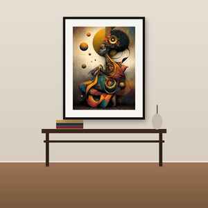 May include: A framed wall art print featuring a stylized figure with a large afro hairstyle, adorned in flowing orange and blue garments. The composition includes floating golden spheres and circular motifs against a soft, gradient background.