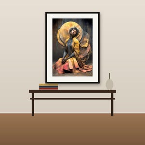May include: A framed wall art print featuring a person with dark skin and short hair, wearing a flowing yellow and orange garment. The figure is seated in a meditative pose against a backdrop of large, overlapping golden circular shapes.