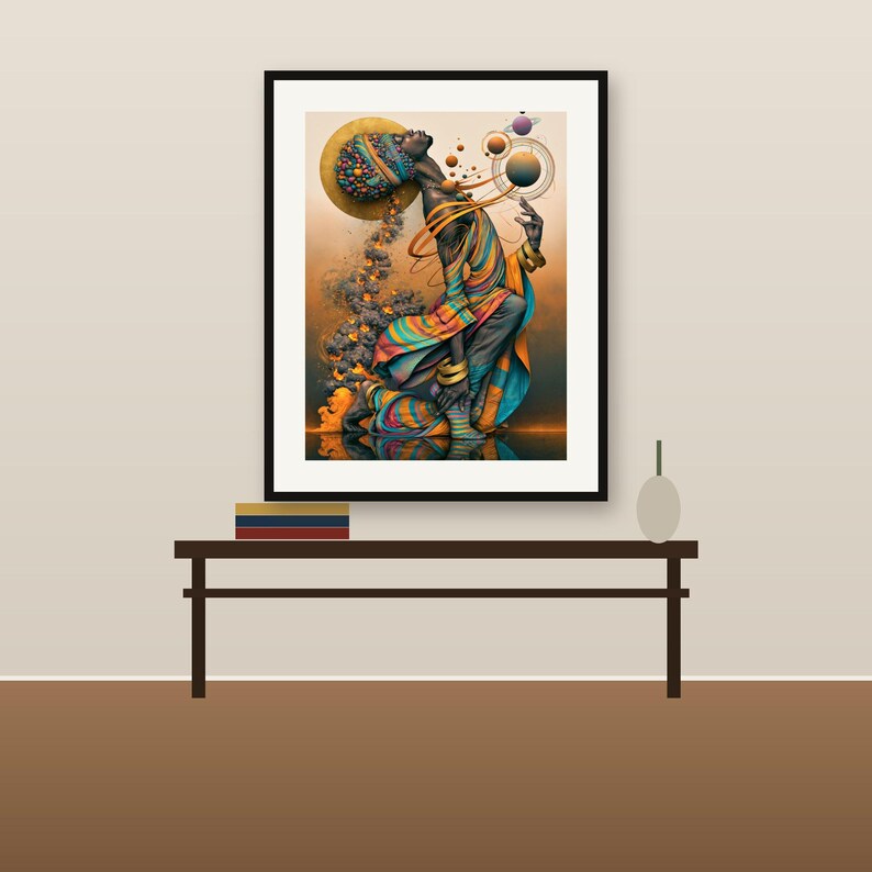 May include: A framed wall art print featuring a kneeling figure with a vibrant, multi-colored striped garment and headpiece. The figure is surrounded by floating celestial spheres and golden rings against a warm, gradient background.