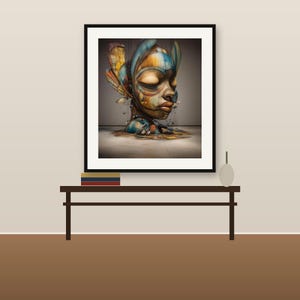 May include: A framed wall art print featuring a stylized, abstract human head sculpture in shades of blue, gold, and brown. The artwork displays intricate, layered textures and organic shapes, presented in a black frame hanging on a wall.