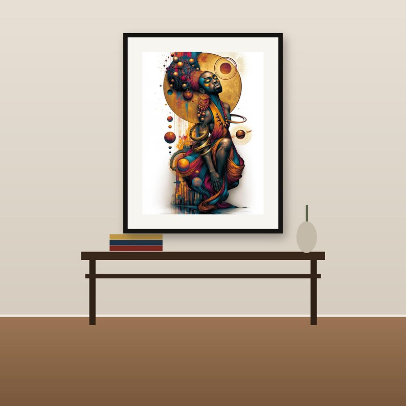 May include: A framed art print featuring a stylized figure with dark skin, adorned in vibrant orange, blue, and gold garments. The figure is surrounded by celestial spheres, rings, and abstract shapes against a white background, all enclosed in a black frame.