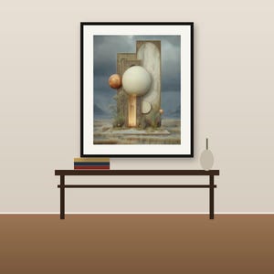May include: A framed wall art print featuring a surreal landscape with tall, textured rectangular pillars, a large central white sphere, and smaller copper-colored orbs. The scene includes sparse desert vegetation under a cloudy, dark sky.