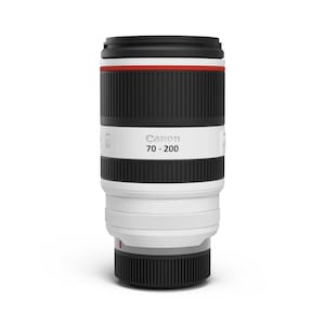 May include: A white and black Canon 70-200 camera lens featuring a prominent red ring near the top. The cylindrical lens body includes textured black rubber grip rings, a white barrel, and the Canon logo with the text 70-200 printed on the front.