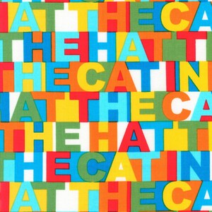 May include: A colorful fabric with a repeating pattern of the words "AT THE CAT IN THE HAT THE CAT IN THE" in a variety of colors, including red, blue, yellow, green, and orange.
