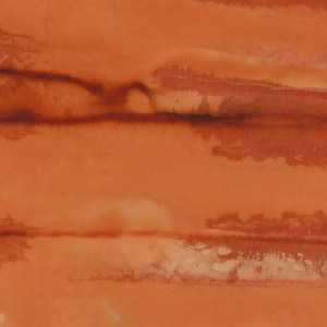 May include: A close-up of a textured orange fabric with subtle brown and white patterns. The fabric has a soft, slightly wrinkled appearance.