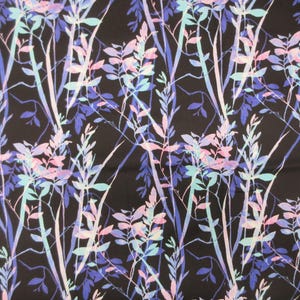 May include: Black fabric with a repeating pattern of stylized plants. The design features vertical stems and leaves in shades of pink, blue, and white, creating a delicate, naturalistic aesthetic.