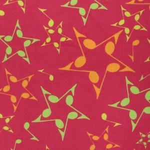 May include: A vibrant red background is covered with a repeating pattern of musical note stars. The stars are outlined in orange and green, with the notes inside the stars in a contrasting color. The musical notes are also scattered throughout the design.