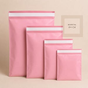 May include: Four rectangular pink poly mailers of varying sizes arranged in a cascading row. Each mailer features a horizontal white adhesive strip at the top. A small square logo in the upper right corner displays the text BOXPETAL Pack & Craft.