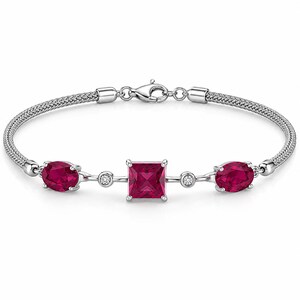 May include: A silver-toned bracelet featuring a central square-cut deep red gemstone flanked by two smaller round clear stones and two larger oval-cut deep red gemstones. The band consists of a woven metal chain with a lobster claw clasp closure.