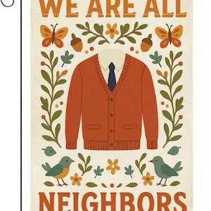 May include: A rectangular garden flag featuring the text WE ARE ALL NEIGHBORS in orange. The center displays an orange button-down cardigan over a white collared shirt and dark blue tie, surrounded by orange butterflies, acorns, and green birds.